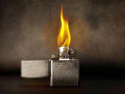 A lighted Zippo lighter