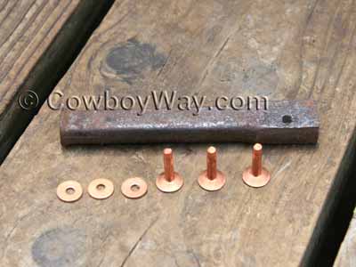 A copper rivet and burr setter tool with copper burrs and rivets