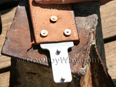 Place burrs on the posts of the rivets