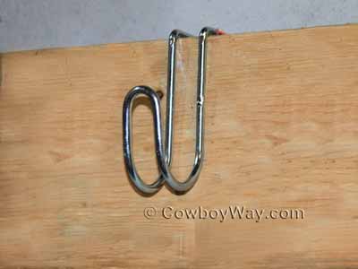 Bridle hook on a board