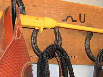 Bridle hook made out of horse shoes