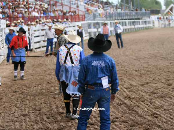 Waiting for the next bull out of the chute Waiting for the next bull out of the chute