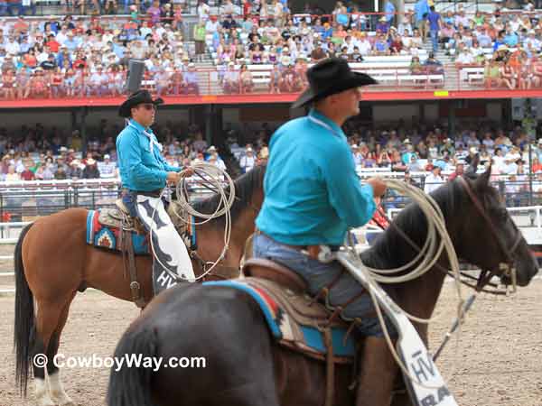 Pickup men at the Cheyenne Frontier Days 
Rodeo