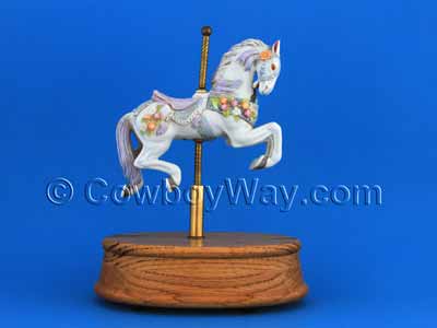 An ornate musical carousel horse in a dramatic pose