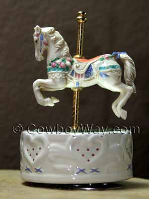 A carousel horse that turns on the base with the music