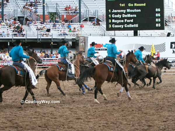 Pickup men at the Cheyenne Frontier Days Rodeo Pickup men at the Cheyenne Frontier Days Rodeo