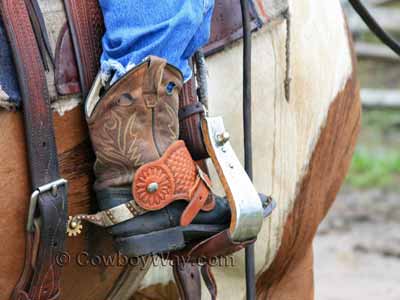 Toddler cowboy boots with leather uppers and a rigid sole