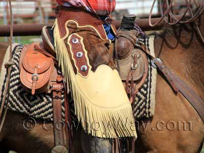 Chinks worn by a cowboy
