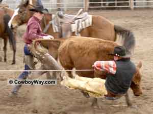 A cowboy getting clothslined