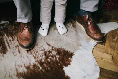 A cowhide cowboy rug