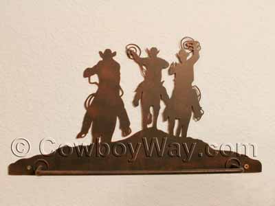 Cowboys on a towel rack