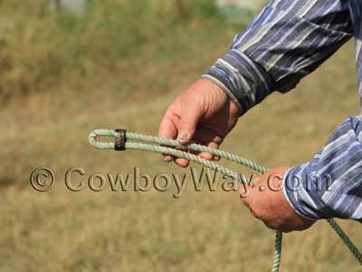 Slide the horn knot farther down the rope