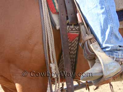 A mohair cinch dyed with red and black accents