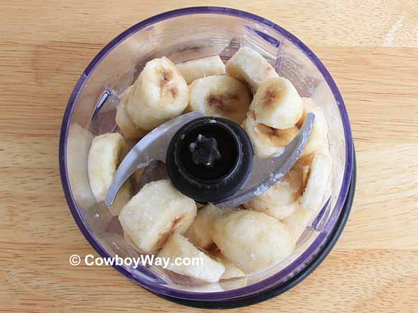 Frozen bananas pieces in a blender