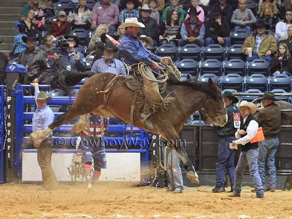 Bruce Beeman rides a ranch bronc at the WRCA Finals