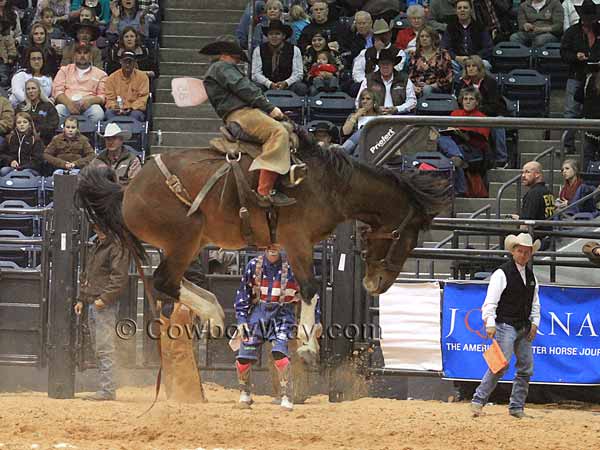 Kyle McCord riding a ranch bronc at the WRCA Finals