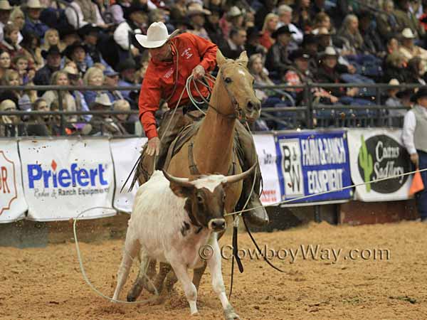 In the stray gathering event, Bruce Beeman ropes both heels