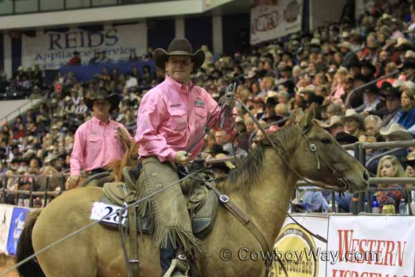 Daniel Scribner catches a calf in the team branding ranch rodeo event