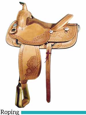 A lightweight floral tooled roping saddle by Big Horn. Weighs approximately 35 pounds.