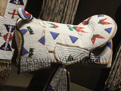 Beaded saddle cover for a horse