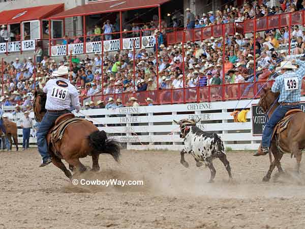 Team roping header Clay Trayan with 
heeler Travis Graves