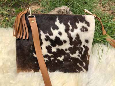 A beautiful, simply styled, cowhide purse
