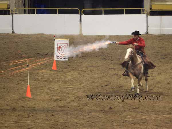 Visible sparks from the mounted shooter's gun