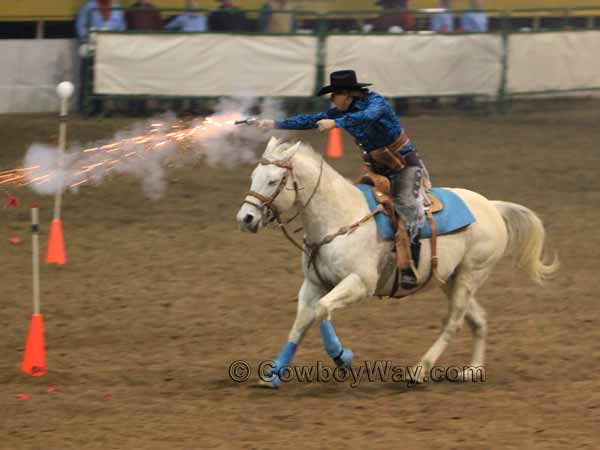 A mounted shooter fires at a ballon target