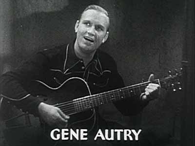 Gene Autry playing a guitar
