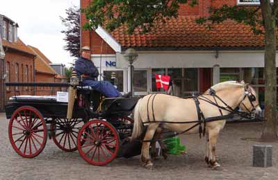 A horse carriage, not a horse cart