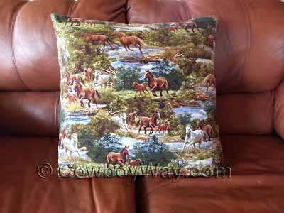A large pillow with horses