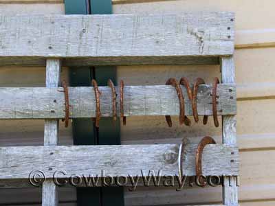 Horseshoes on a wooden pallet