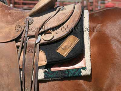 An Impact Gel saddle pad on a ranch horse