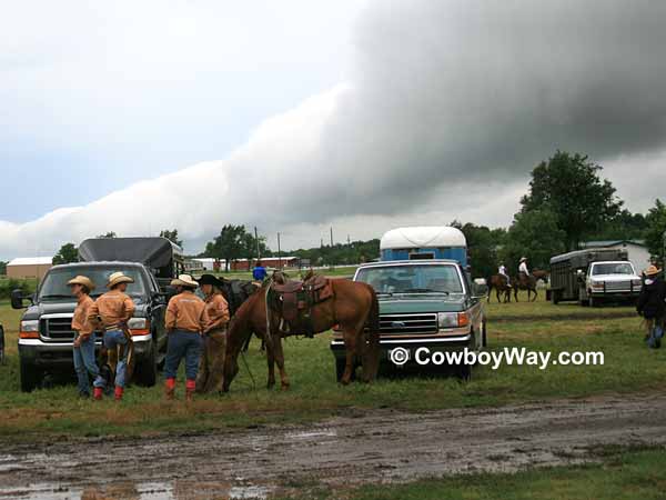 Heavy rain clouds over a women's ranch rodeo