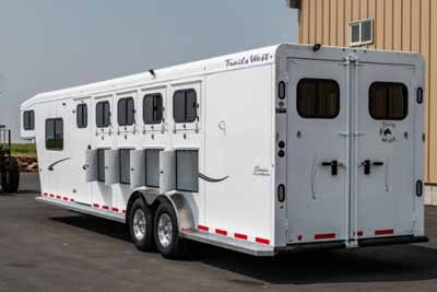 A large slant load horse trailer