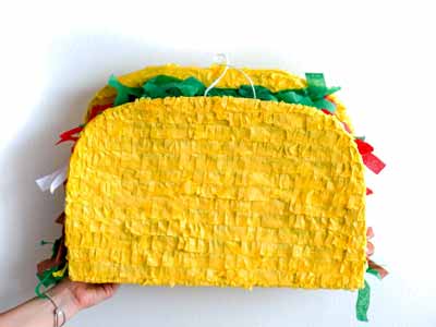 A pinata shaped like a taco