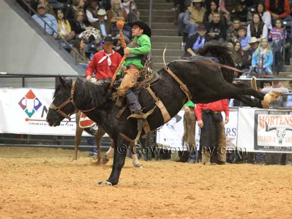 A rider on a ranch bronc