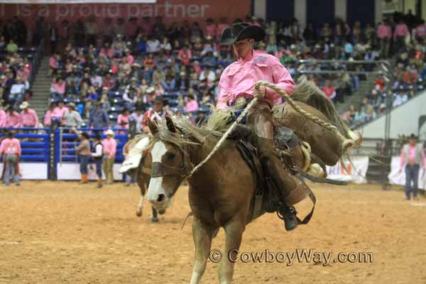 WRCA Ranch Bronc Riding 2014 - Bronc Rider Chaz Brewer on a sorrel bronc