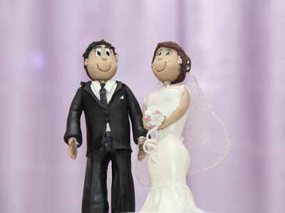 A traditional wedding cake topper