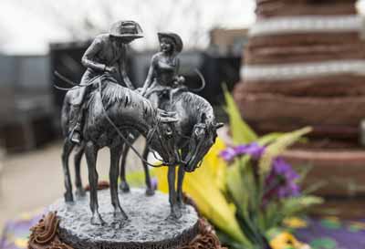 A cowboy/Western cake topper for a wedding