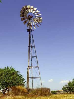 A tall windmill used for pumping water