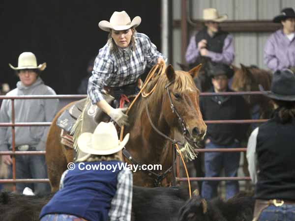 Women's ranch rodeo: A cowgirl ropes heels