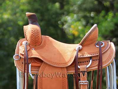 A ranch saddle with a deep seat and high cantle